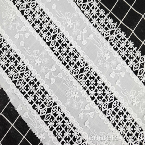 ホワイトポリエステル織物の花カットワークレース刺繍生地